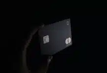 person holding black card